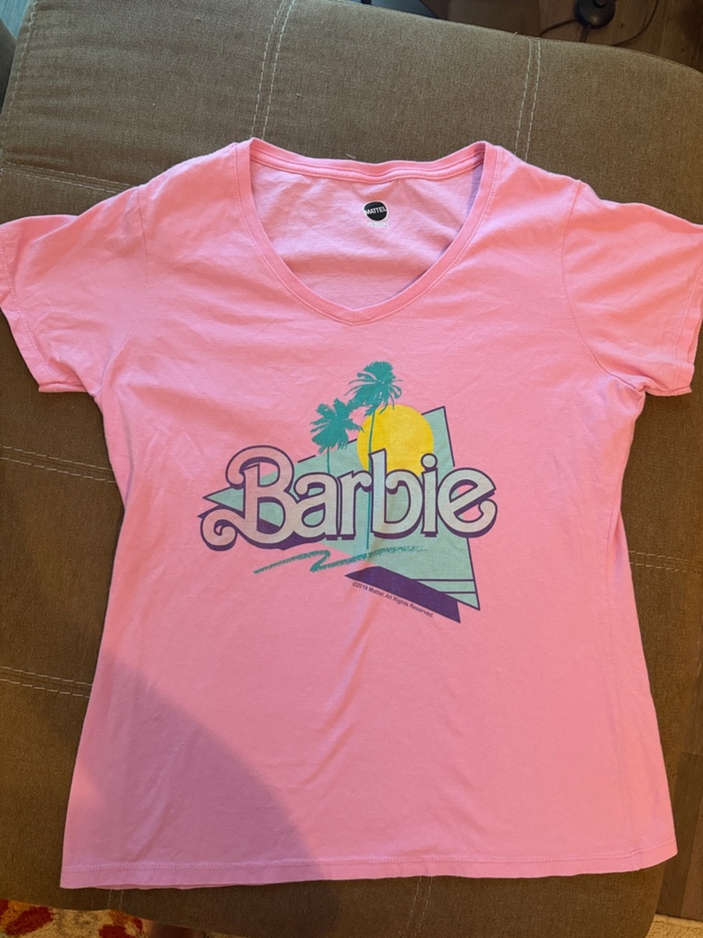 Barbie Pink Tee with Teal, Yellow and Purple Retro Graphic